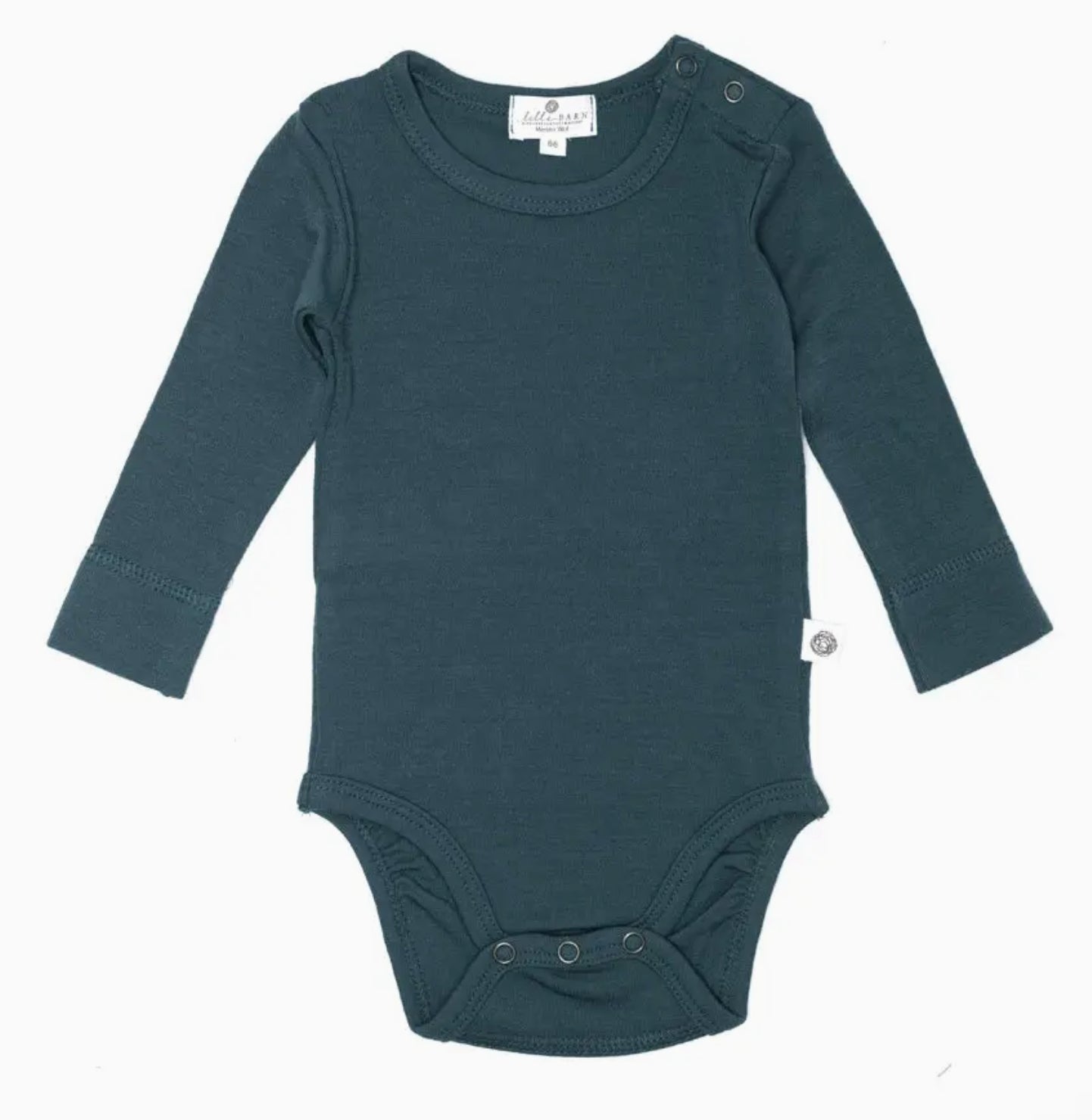 Die kuscheligste Basis für jeden Tag. Der klassische Langarm-Body aus 100% temperaturausgleichender Merinowolle ist sanft zur empfindlichen Babyhaut.