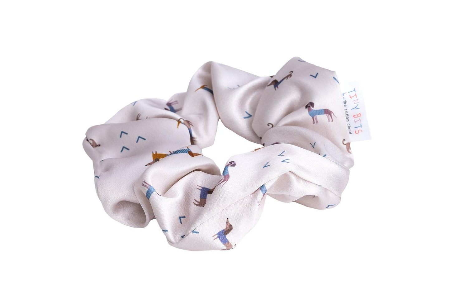 Verhindert Ziepen und Haarbruch! Das weiche Satin-Scrunchie bändigt feines Kinderhaar sicher und sieht dabei zauberhaft glänzend aus.