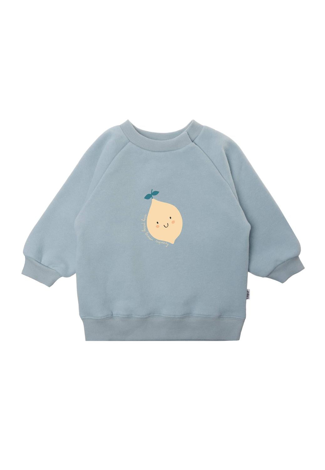 Gute Laune zum Anziehen! Das spritzige hellblaue Sweatshirt mit fröhlichem Zitronen-Print bringt Farbe in graue Tage und ist wunderbar flauschig.