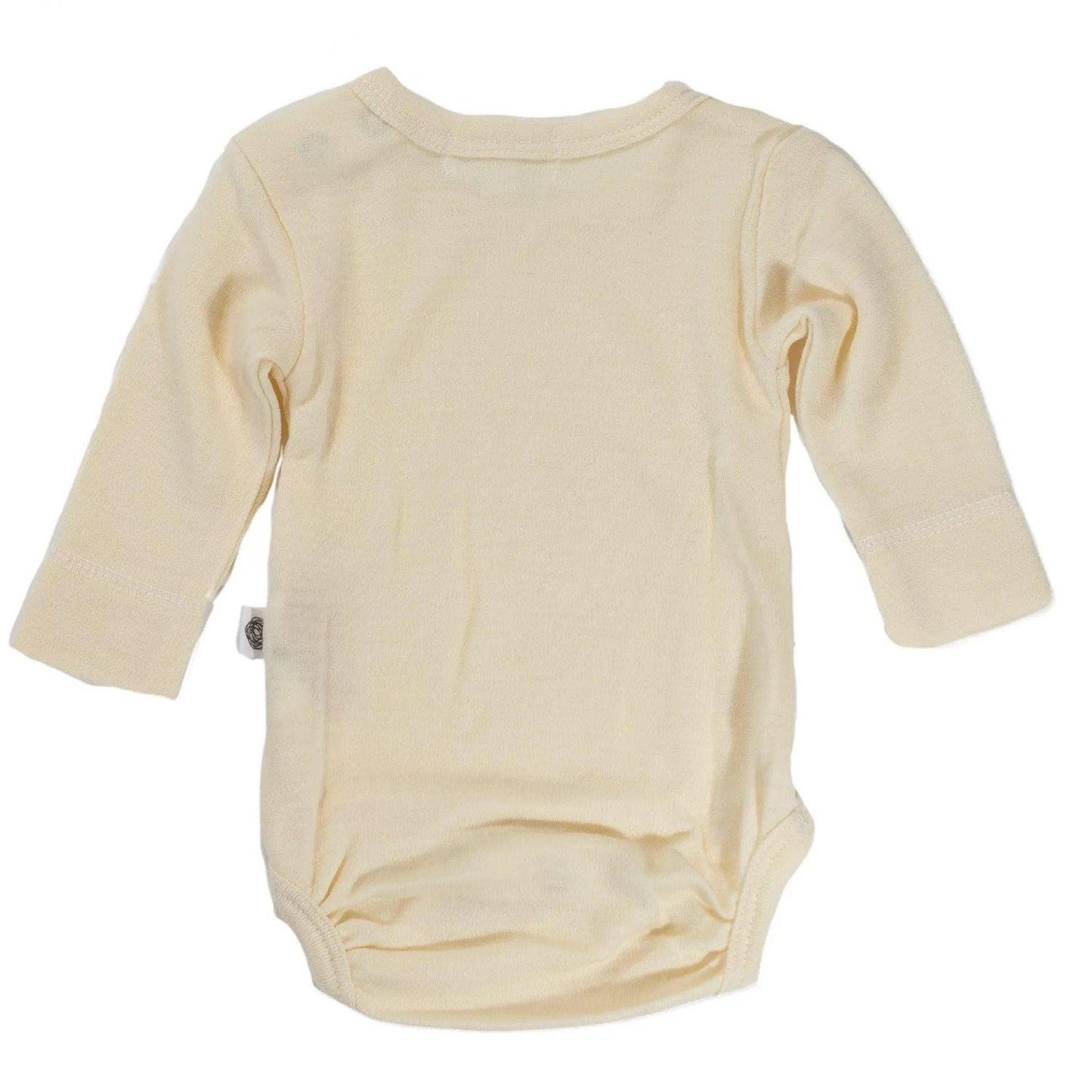 Die kuscheligste Basis für jeden Tag. Der klassische Langarm-Body aus 100% temperaturausgleichender Merinowolle ist sanft zur empfindlichen Babyhaut.