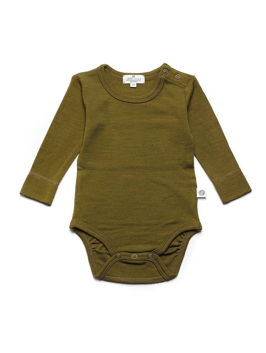 Die kuscheligste Basis für jeden Tag. Der klassische Langarm-Body aus 100% temperaturausgleichender Merinowolle ist sanft zur empfindlichen Babyhaut.