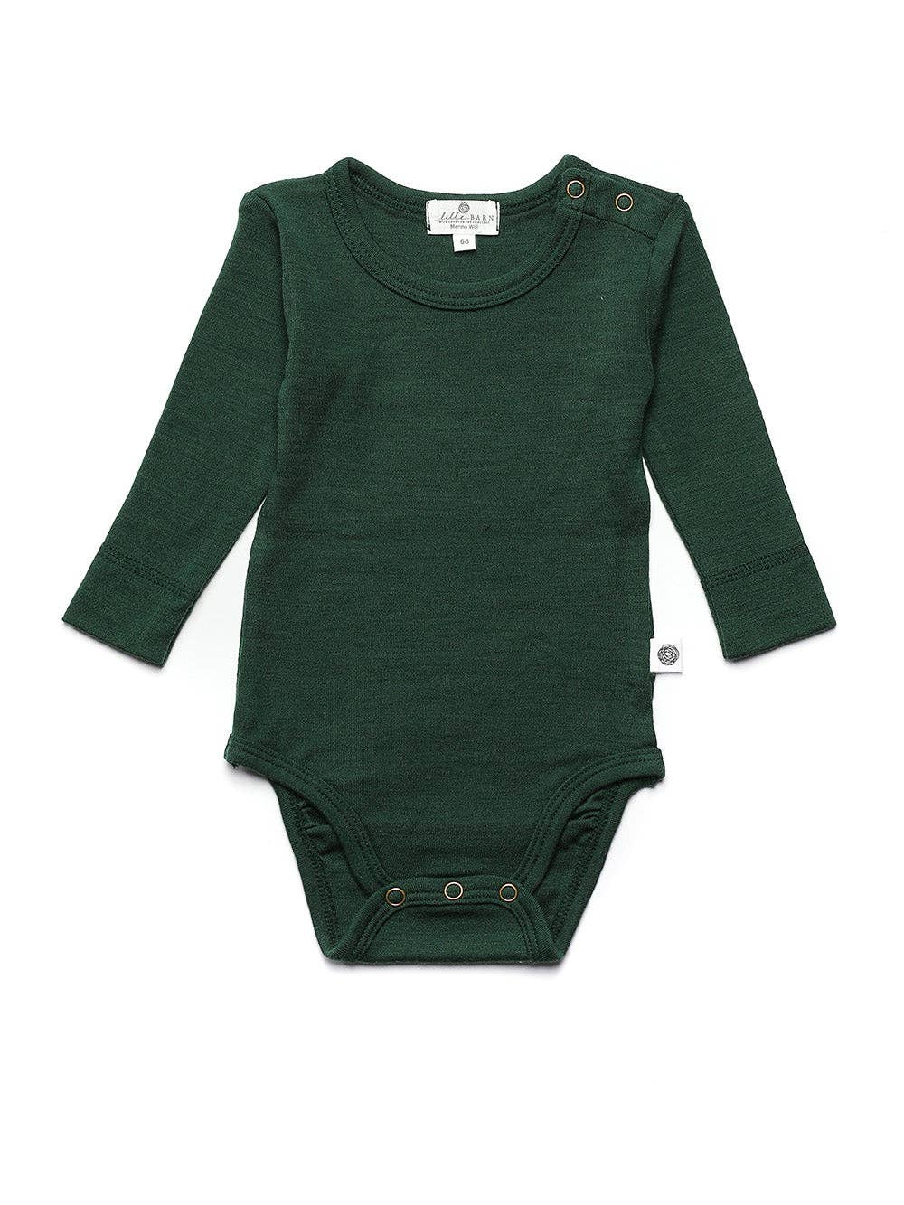 Die kuscheligste Basis für jeden Tag. Der klassische Langarm-Body aus 100% temperaturausgleichender Merinowolle ist sanft zur empfindlichen Babyhaut.