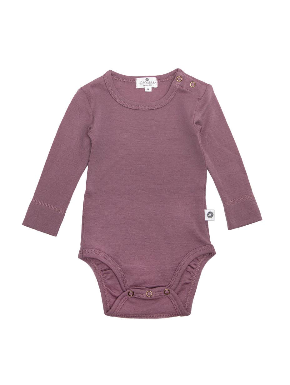 Die kuscheligste Basis für jeden Tag. Der klassische Langarm-Body aus 100% temperaturausgleichender Merinowolle ist sanft zur empfindlichen Babyhaut.
