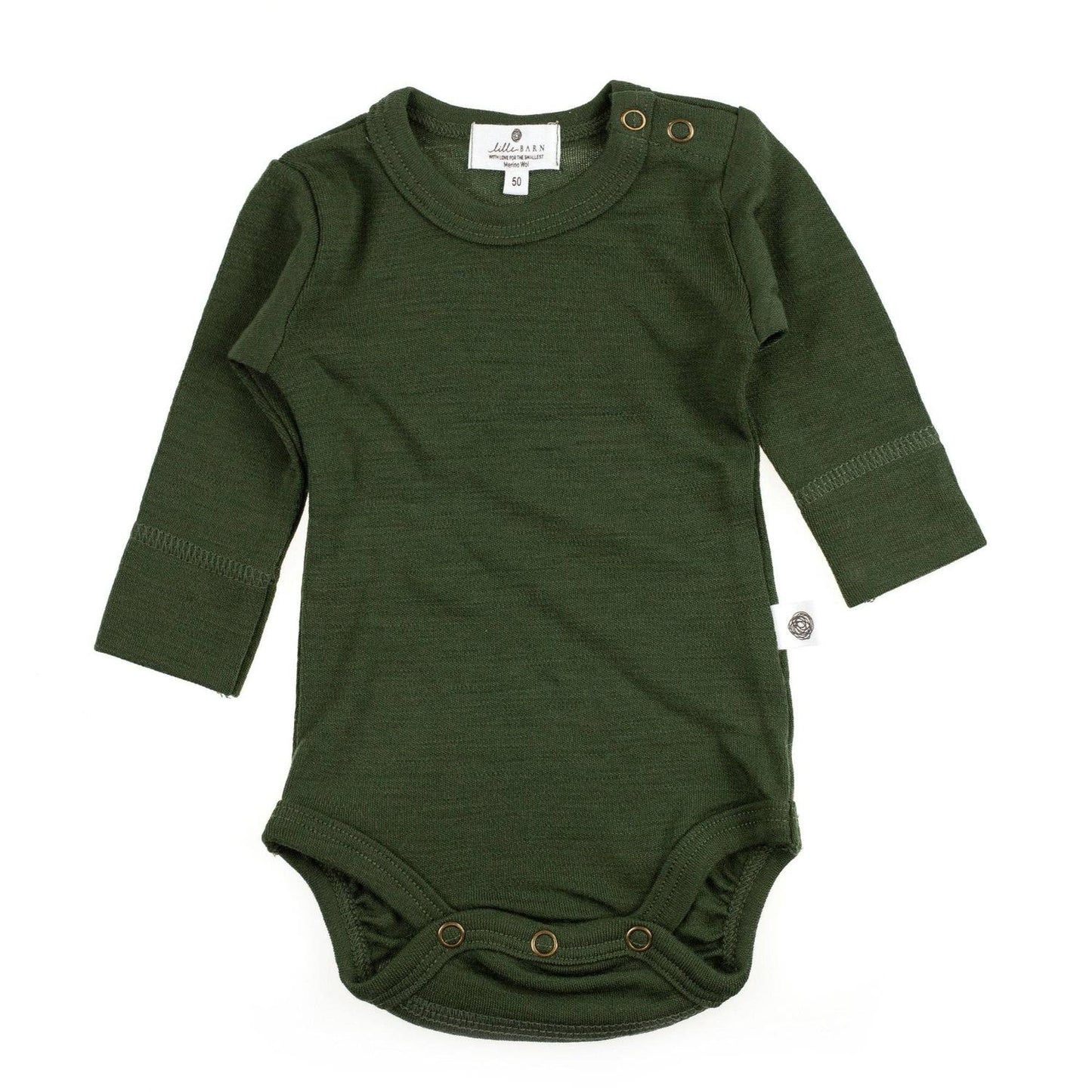 Die kuscheligste Basis für jeden Tag. Der klassische Langarm-Body aus 100% temperaturausgleichender Merinowolle ist sanft zur empfindlichen Babyhaut.