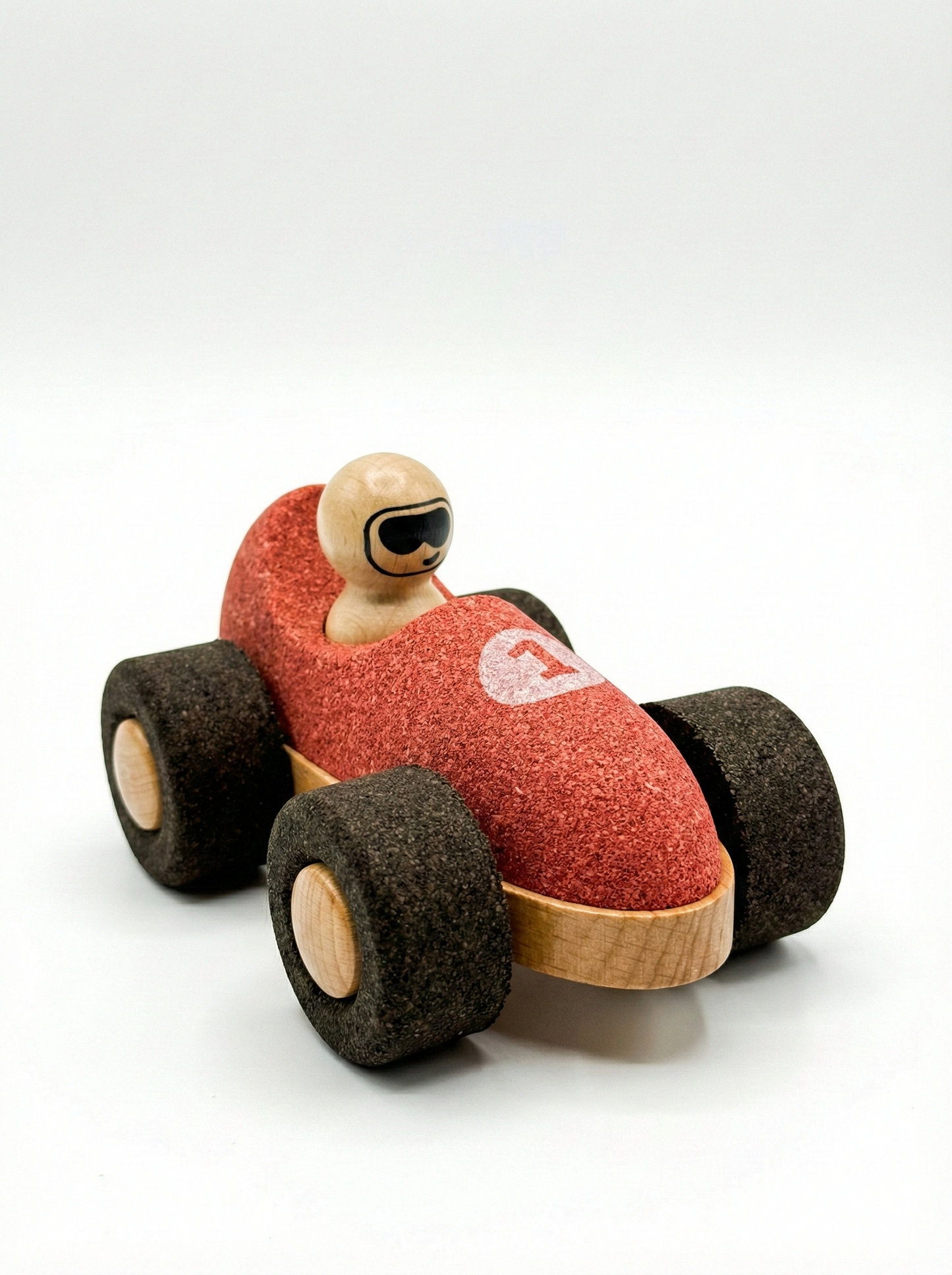 Startschuss für den leisen Flitzer! Der griffige Spielzeug-Rennwagen aus Kork und Holz schont Ohren sowie Fußböden und ist extrem leicht zu greifen.