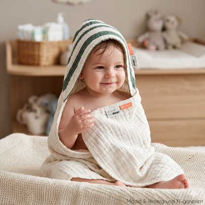 Hüllt dein Baby sanft wie eine Wolke ein. Das saugstarke, mehrlagige Musselin-Badetuch aus 100% Bio-Baumwolle hält das Köpfchen nach dem Baden warm.
