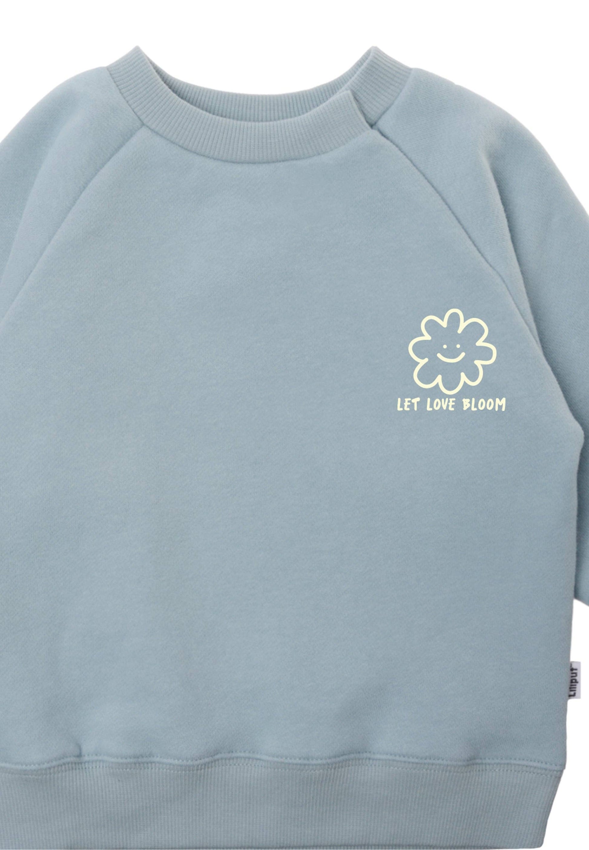 Für den perfekten Mama-Kind-Look! Das weiche hellblaue Sweatshirt der exklusiven Mini & Me Edition ist wunderbar bequem und ein echter Hingucker.