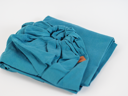 Blitzschnell angelegt und perfekt für kleine Laufanfänger. Der minimalistische Ring Sling aus seidenweicher Bio-Baumwolle schont deine Nerven beim häufigen Auf-und-Ab.