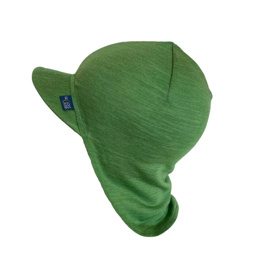 Natürlicher UV-Schutz ohne Schwitzen. Die leichte Mütze mit Schirm aus Bio-Merinowolle und Seide wirkt kühlend und schützt kleine Köpfchen perfekt.