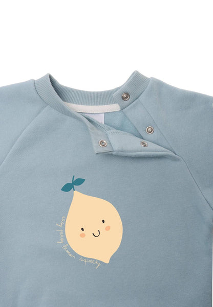 Gute Laune zum Anziehen! Das spritzige hellblaue Sweatshirt mit fröhlichem Zitronen-Print bringt Farbe in graue Tage und ist wunderbar flauschig.