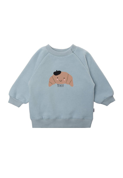 Französischer Chic für die Kleinsten! Das süße Sweatshirt mit Croissant-Print ist butterweich, bequem geschnitten und zum Anbeißen niedlich.