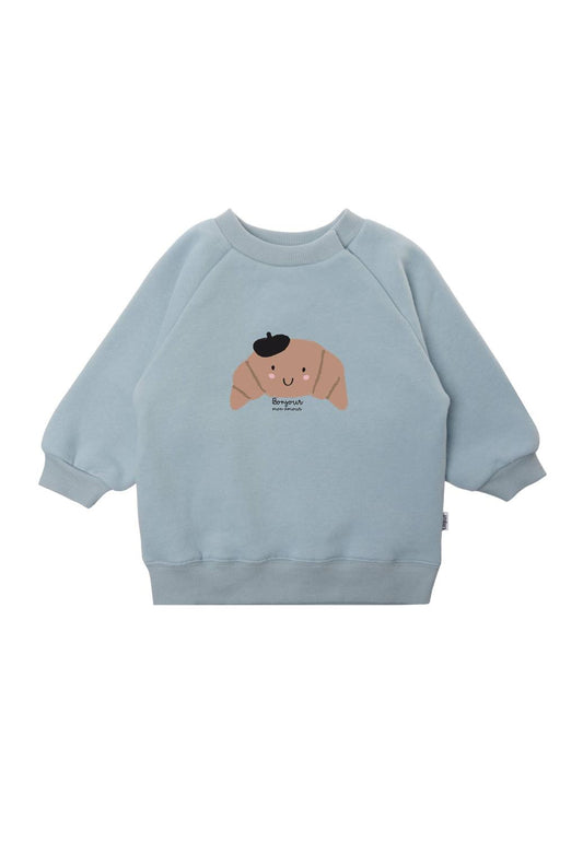 Französischer Chic für die Kleinsten! Das süße Sweatshirt mit Croissant-Print ist butterweich, bequem geschnitten und zum Anbeißen niedlich.