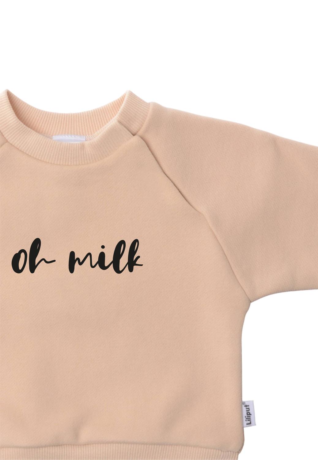 Das Must-Have für kleine Milch-Fans! Das trendige beige Sweatshirt mit humorvollem """"Oh Milk""""-Statement überzeugt durch extra weichen Tragekomfort.""