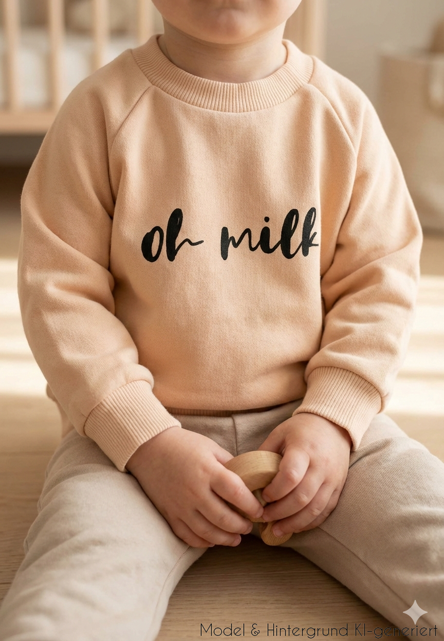 Das Must-Have für kleine Milch-Fans! Das trendige beige Sweatshirt mit humorvollem """"Oh Milk""""-Statement überzeugt durch extra weichen Tragekomfort.""