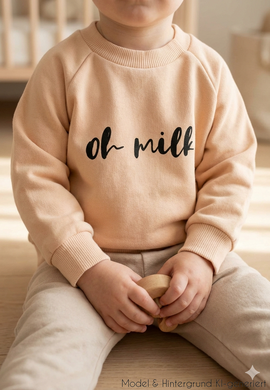 Das Must-Have für kleine Milch-Fans! Das trendige beige Sweatshirt mit humorvollem """"Oh Milk""""-Statement überzeugt durch extra weichen Tragekomfort.""