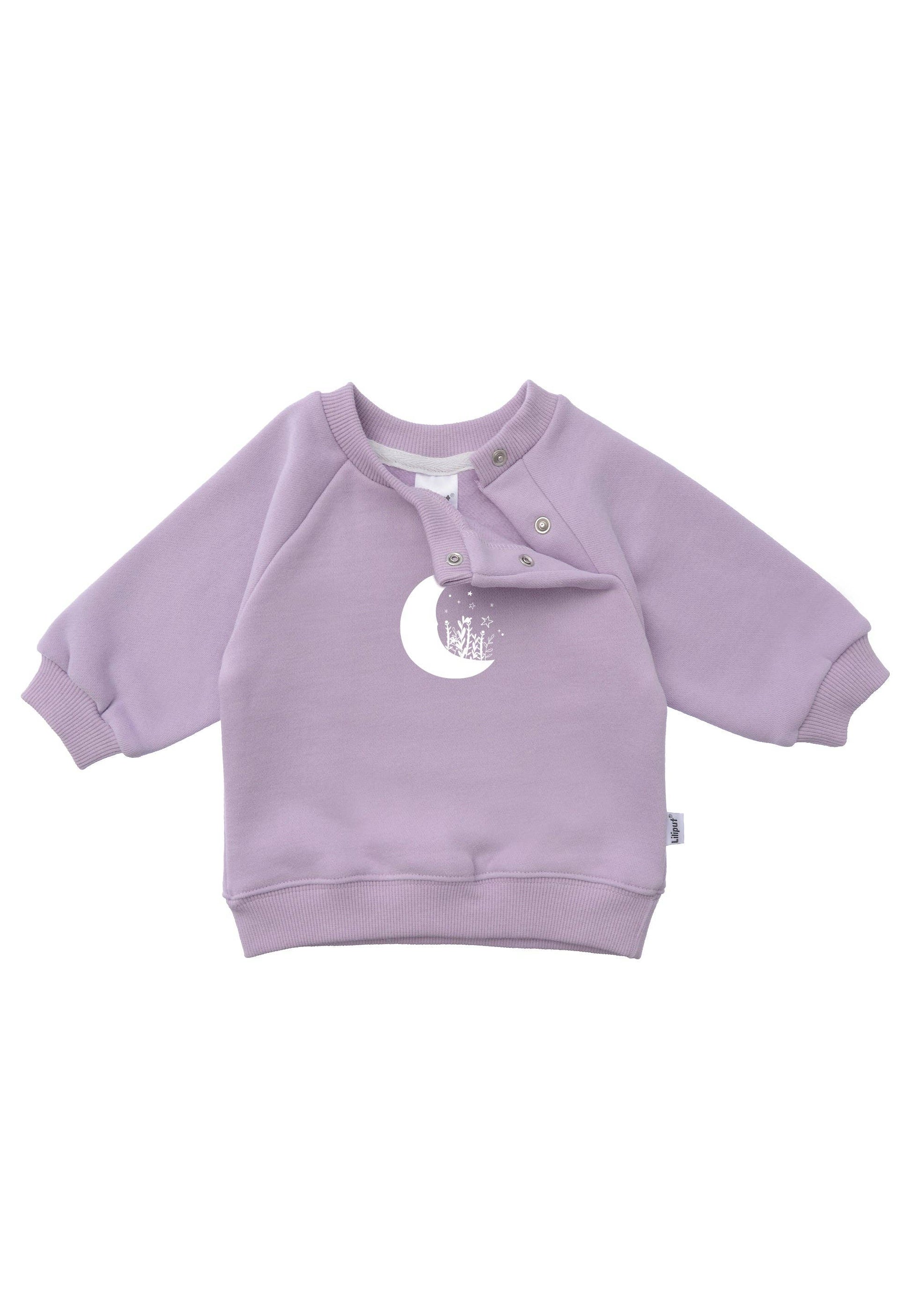Kuschelig warm und magisch schön. Das fliederfarbene Sweatshirt mit Mond-Print ist der bequeme Alltagsbegleiter für kleine Träumer und Abenteurer.