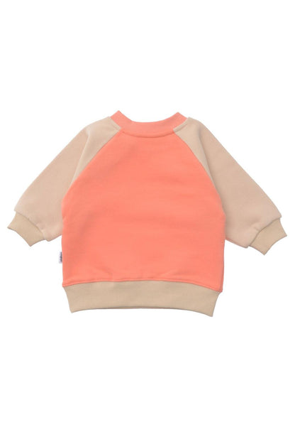 Für kleine Herzblätter! Das warme Sweatshirt in trendigem Orange und Beige mit liebevollem Herz-Print ist der perfekte Mix aus Geborgenheit und Style.