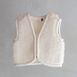 Van Buren Baby-Bodywarmer Nilo aus Wolle in Cremeweiß, liegend von vorn